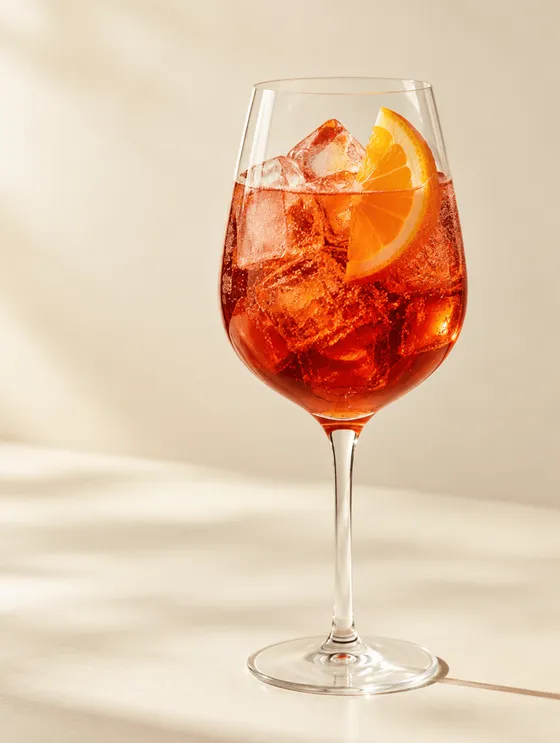 The Americano — The ancestor: drop the gin entirely, bring back the soda.